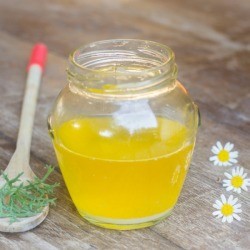 Glass jar of ghee.