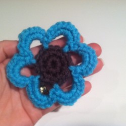 hand holding finished flower