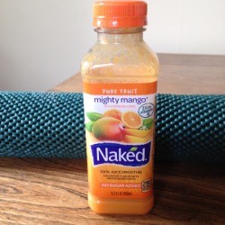 Shelf liner behind bottle.