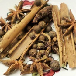 A plate of herbs and spices.