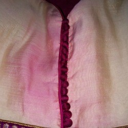 Closeup of dye bleed damage on a dress.