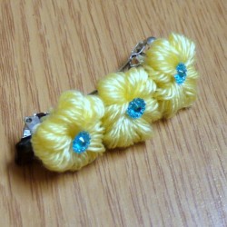 Yarn Flower Hair Clip - finished clip with yellow yarn flowers