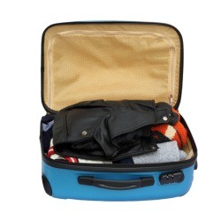 Small packed suitcase open against a white background