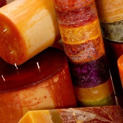Pile of unused candles showing wear