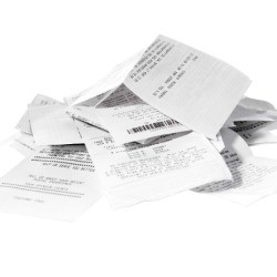 Pile of receipts on a white background
