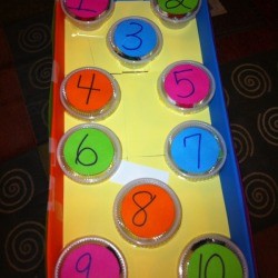 finished box with multicolored lids showing 