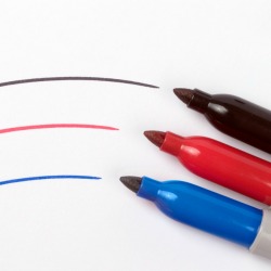 3 Sharpie Markers with a pen line.