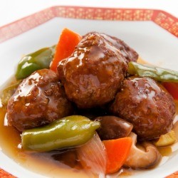 Meatballs with bell peppers and mushrooms.