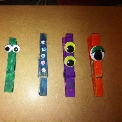 four different monster clothes pins
