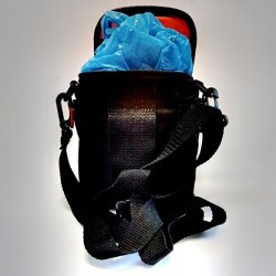 A camera case stuffed with grocery bags to retain it's shape while stored.