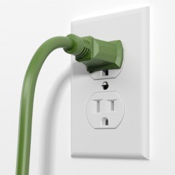 Electrical outlet with a green cord plugged in.