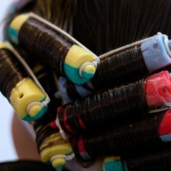Close up of a woman getting perm.