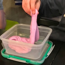 Homemade Flubber - plastic storage bowl with pink flubber
