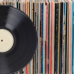 Records in a row, one in front.