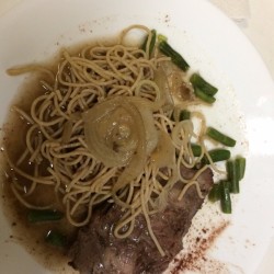 Bottom Round Roast with Onion Gravy on plate