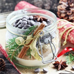 A gift jar with ingredients for baking cookies.