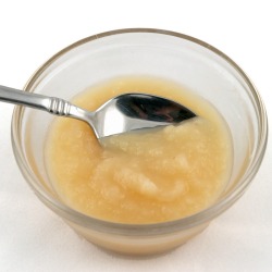 A bowl of applesauce.