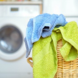 Towels in a laundry basket.