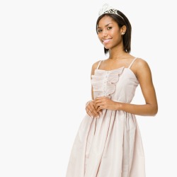 A high school girl wearing a nice prom dress.