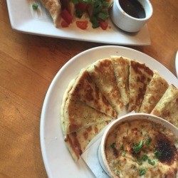 Some happy hour appetizers at a restaurant.
