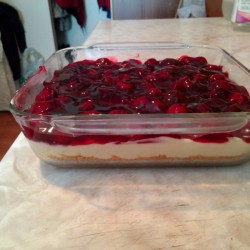 A no bake cherry cheesecake in a sheet pan.
