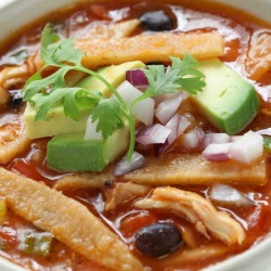 A bowl of chicken tortilla soup.