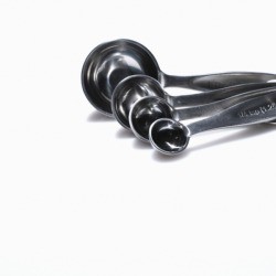 A set of silver measuring spoons.