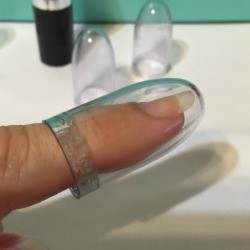 Use Lipstick Cap as Thimble - clear plastic cap over finger