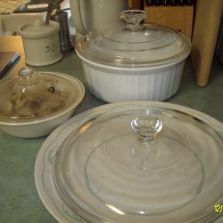 An old casserole lid covering a plate.