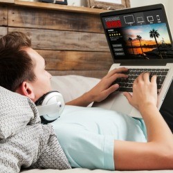 A man watching a video through a streaming service.