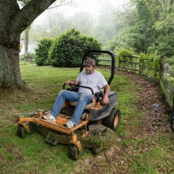 Man on Riding Lawn Mower