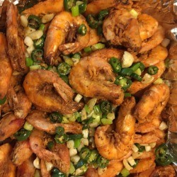 Crunchy Fried Shrimp on foil lined tray.