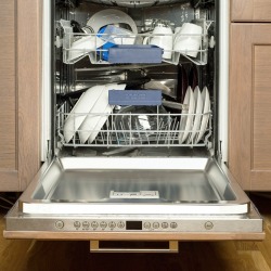 A dishwasher with the door open.