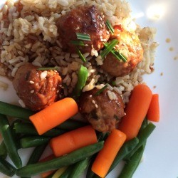 Teriyaki Meatballs on plate with rice and vegetables