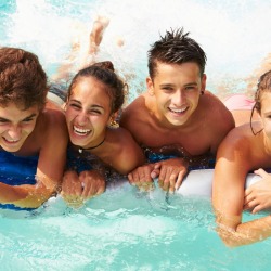 4 teens at a co-ed pool party.