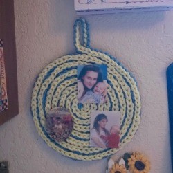 Spiral Yarn Photo Frames - flat spiral with photos 