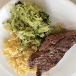 Sautéed Shredded Zucchini on dinner plate 