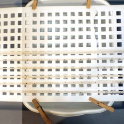 Easy Seed Tape - two dish mats clipped together with the paper taped to them