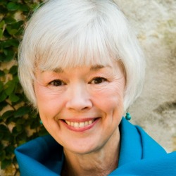 An older woman with white hair.