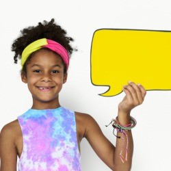 A girl holding a speech bubble.