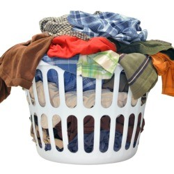 A laundry basket full of clothes.