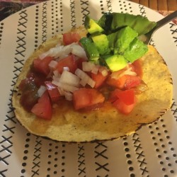 assembling Tostada on plate