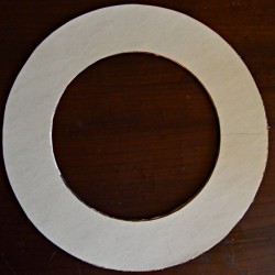 A wreath base made from a recycled record album cover.