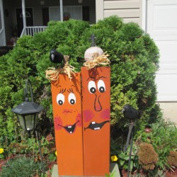 Scrap Wood Halloween Decorations - goofy pumpkin like faces