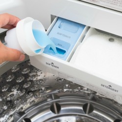 Pouring Liquid Fabric Softener