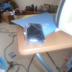 A phone protected by Saran Wrap.