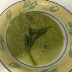 A bowl of pureed asparagus soup.