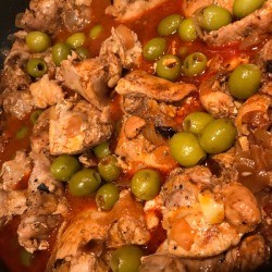 Chicken with Green Olives in pan 