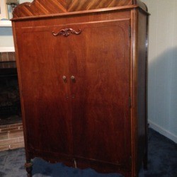 Value of Vintage Wardrobe - beautiful wardrobe with decorative vertical veneer on top 