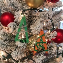 Popsicle Stick Christmas Tree Ornaments - two ornaments on flocked tree